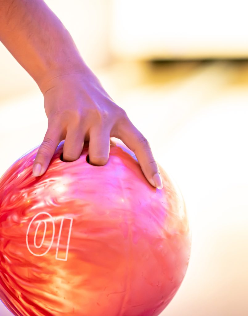 Hand holding a bowling ball